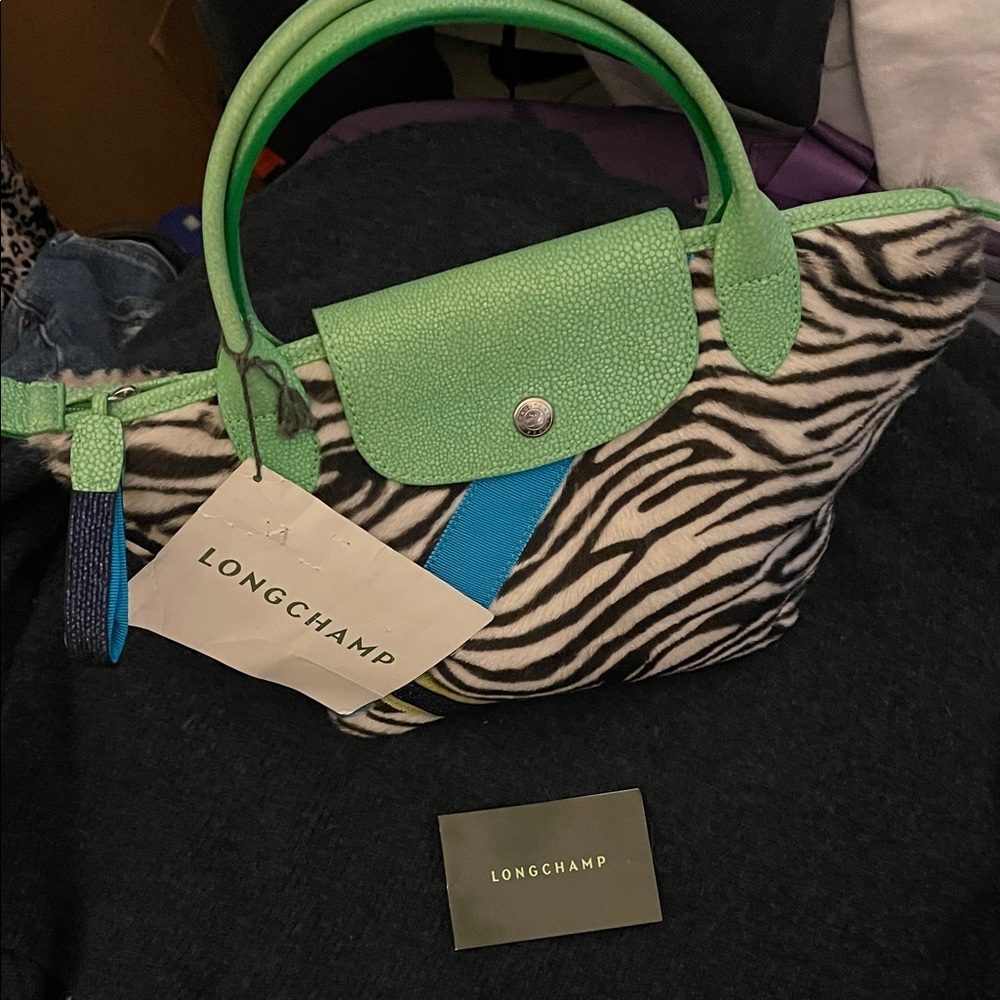 Super cool:  LONGCHAMP PILAGE Lamb skin leather bag.